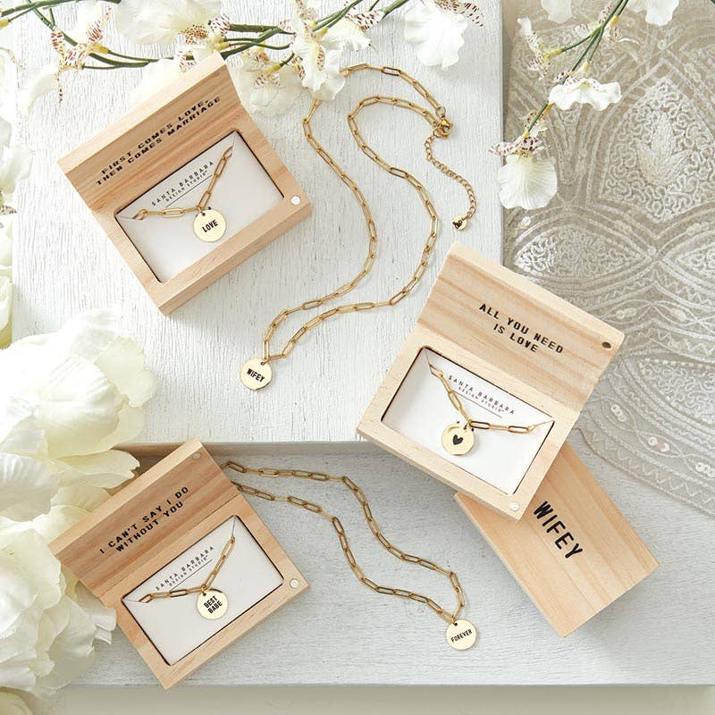 Stainless steel gold plated necklaces in wooden boxes which are personalized with name or initials