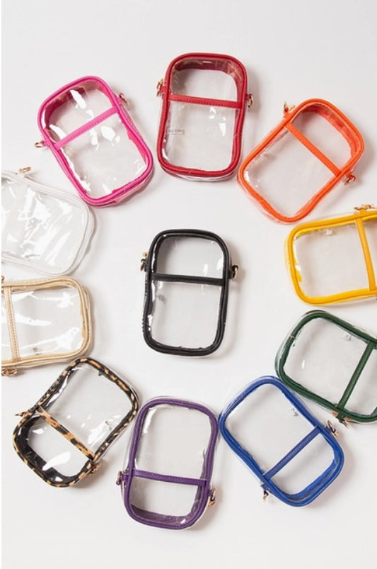 Clear crossbody bag with colorful trim, available in various edge colors such as pink, blue, and yellow