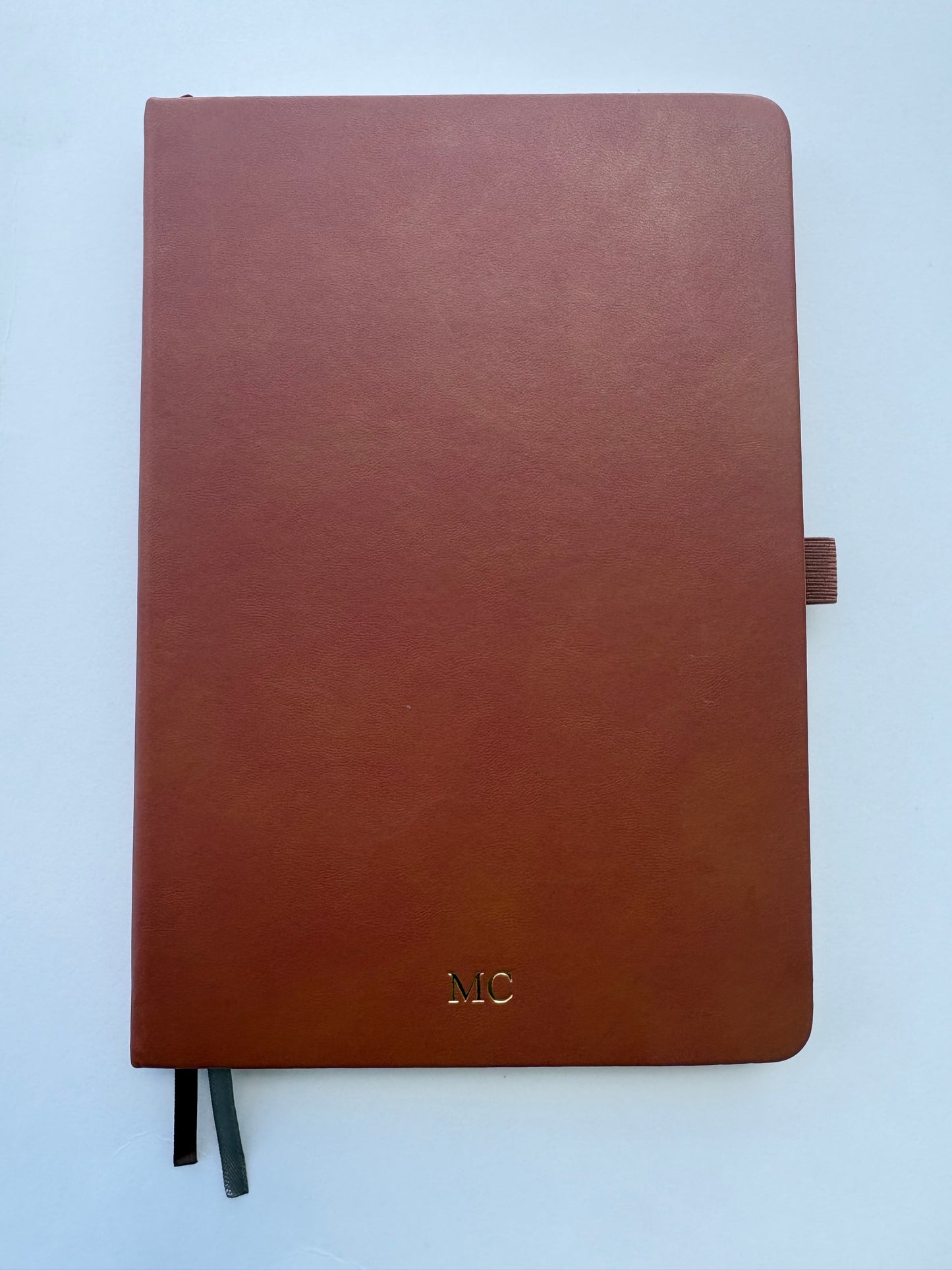 Personalized brown leather journal with gold foil monogram on hardcover A5 notebook